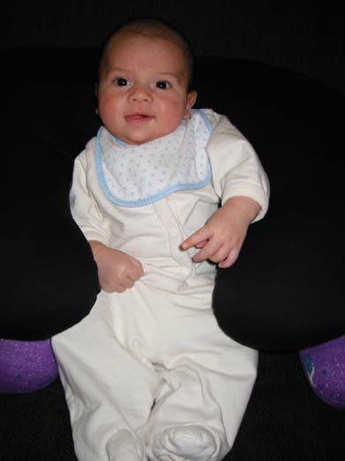 Casey smiling from the boppy -- 3/10/02